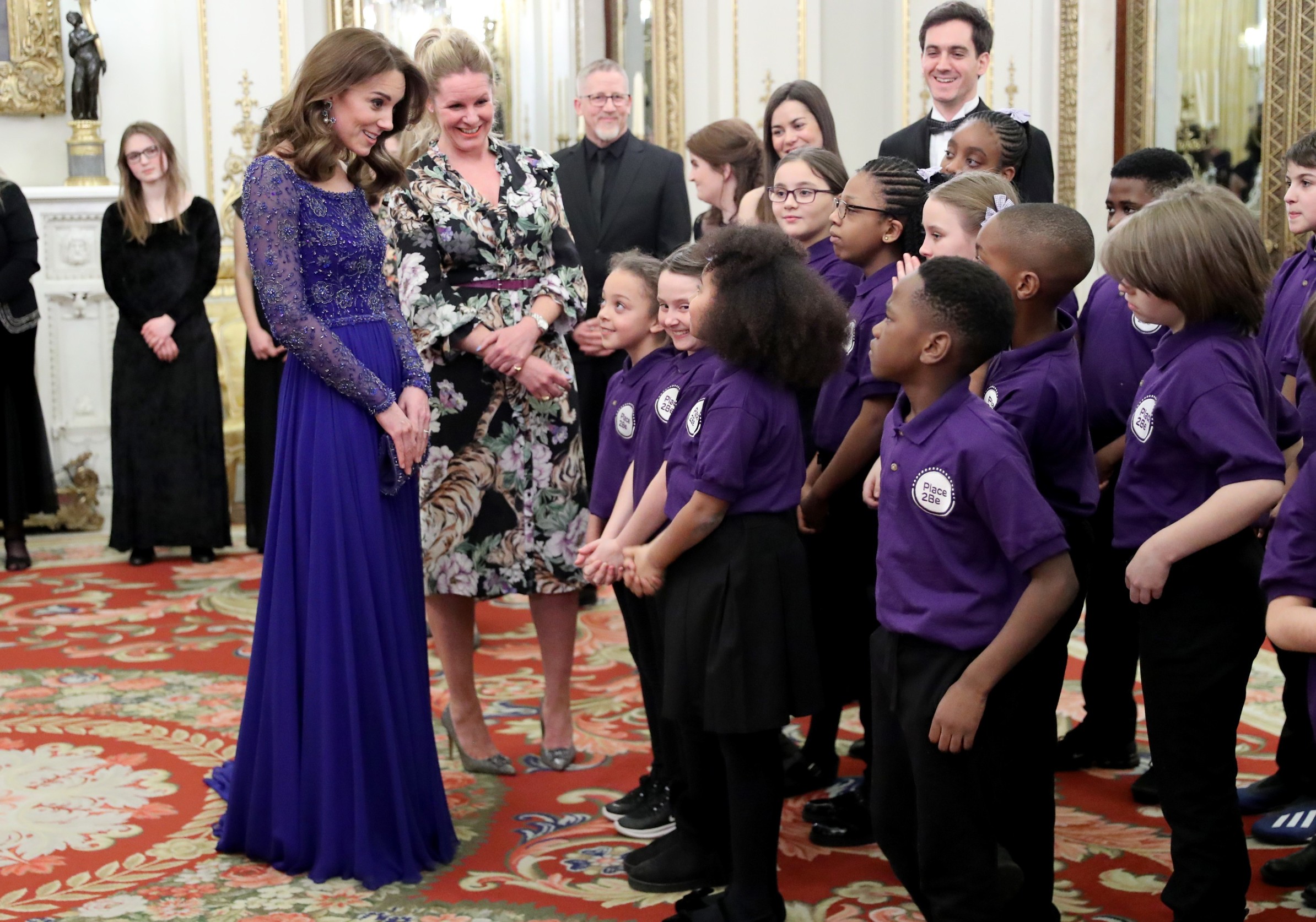 Catherine Duchess of Cambridge speaks with a school choir as she hosts a Gala Dinner in celebration of the 25th anniversary of Place2Be at Buckingham Palace.
Place2Be 25th Anniversary Gala Dinner, Buckingham Palace, London, UK - 09 Mar 2020
The Duchess is Patron of Place2Be, which provides emotional support at an early age and believes no child should face mental health difficulties alone., Image: 504944403, License: Rights-managed, Restrictions: , Model Release: no, Credit line: REX / Shutterstock Editorial / Profimedia